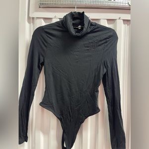 Black turtleneck bodysuit